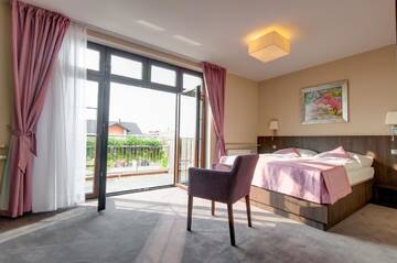 Фото номера Двухместный номер с 1 кроватью и балконом Отель Hotel Figa г. Plewiska 4